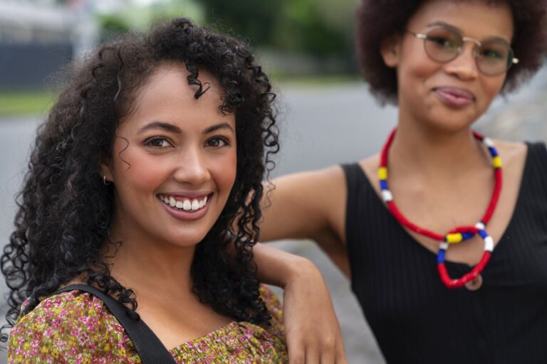 two-female-friends-having-fun-together-outdoors